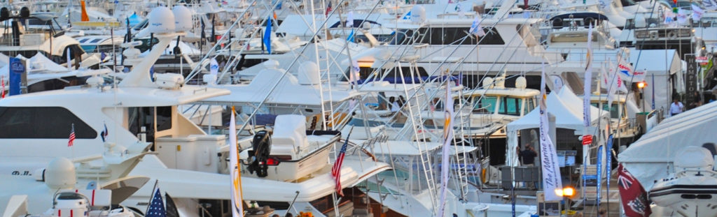 boats at dock with flags